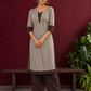Elegant Beige Ajrakh Striped Cotton Kurta with Contrast Black Floral patch in Neckline & Sleeve Cuffs — front view