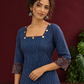 Navy Blue Ajrakh Striped Cotton Kurta with Contrasting Maroon Ajrakh Print Hemline and Sleeve Cuffs — styled view
