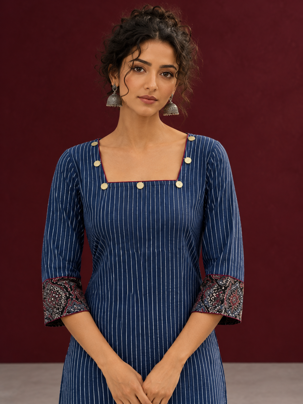 Navy Blue Ajrakh Striped Cotton Kurta with Contrasting Maroon Ajrakh Print Hemline and Sleeve Cuffs — fabric detail