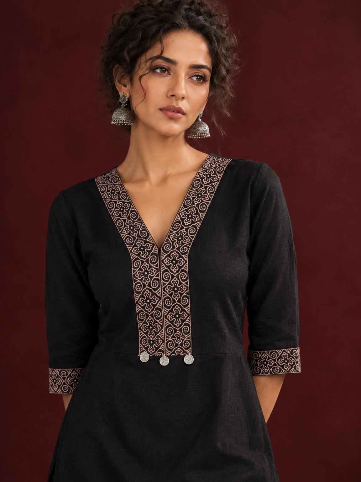 Timeless Black Cotton Kurta with Contrast Beige Ajrakh Printed V-Neck Panel & Matching Sleeve Cuffs — fabric detail