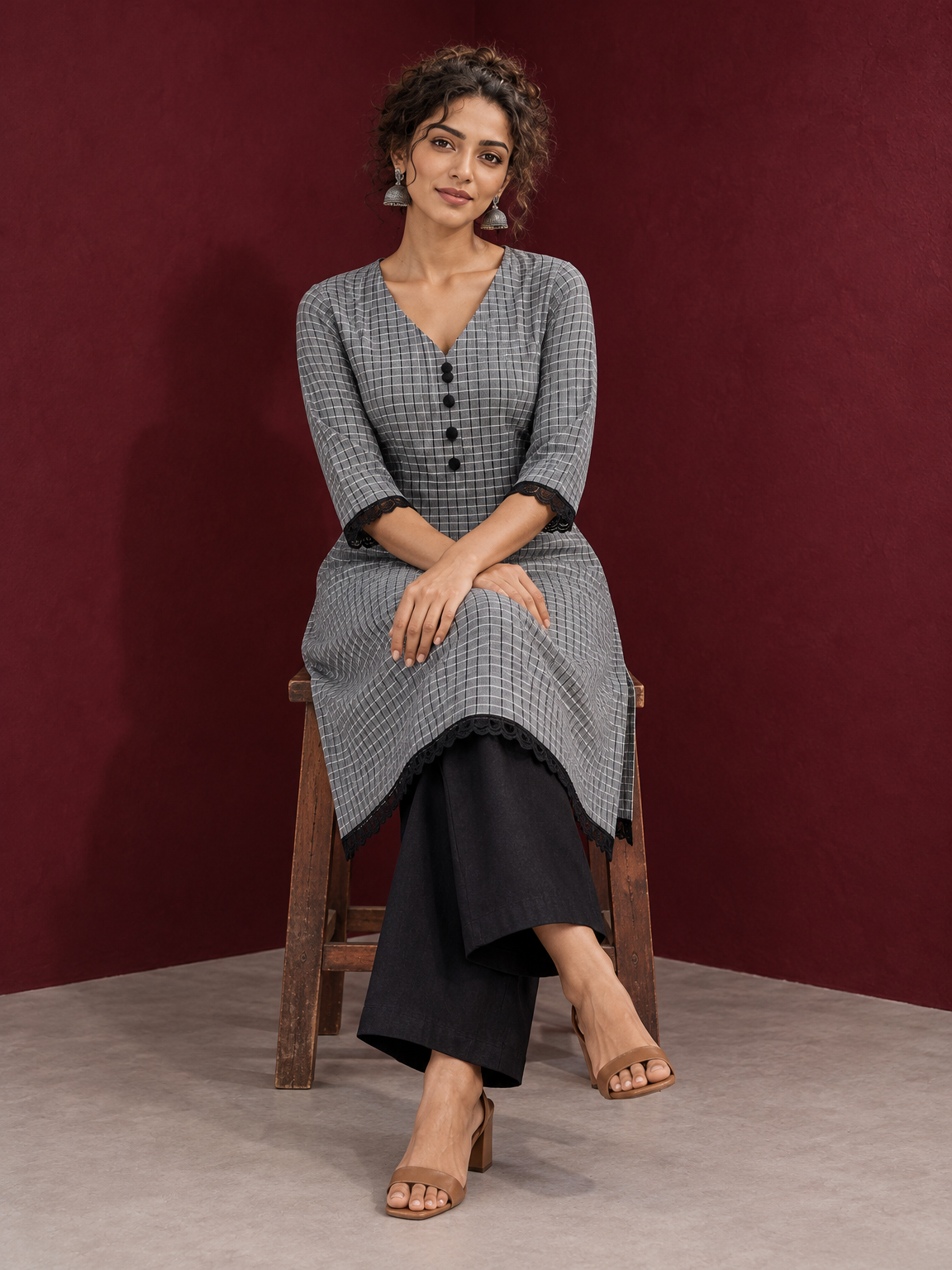 Classic Grey Ikat Checked Cotton Kurta with Black Lace Trim Sleeves and Asymmetric Button Placket — seated