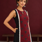 Classic Black Cotton Kurta with Maroon Polka Dot Triangle Panel & Crochet Lace Trim — styled view