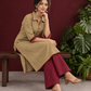 Timeless Beige Cotton Asymmetric Kurta with Maroon Lace Collar and Contrast Maroon Accent — seated