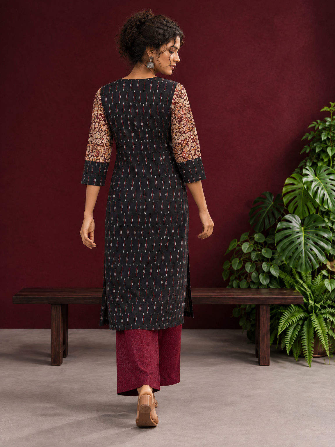 Timeless Black Ikat Cotton Kurta with Contrast Kalamkari Print Sleeves & Keyhole Neckline — back view