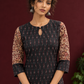 Timeless Black Ikat Cotton Kurta with Contrast Kalamkari Print Sleeves & Keyhole Neckline — styled view
