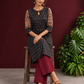 Timeless Black Ikat Cotton Kurta with Contrast Kalamkari Print Sleeves & Keyhole Neckline — seated