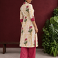 Ivory floral printed kurta with pink and green flowers, a V-neck, and contrasting pink cuffs. — back view