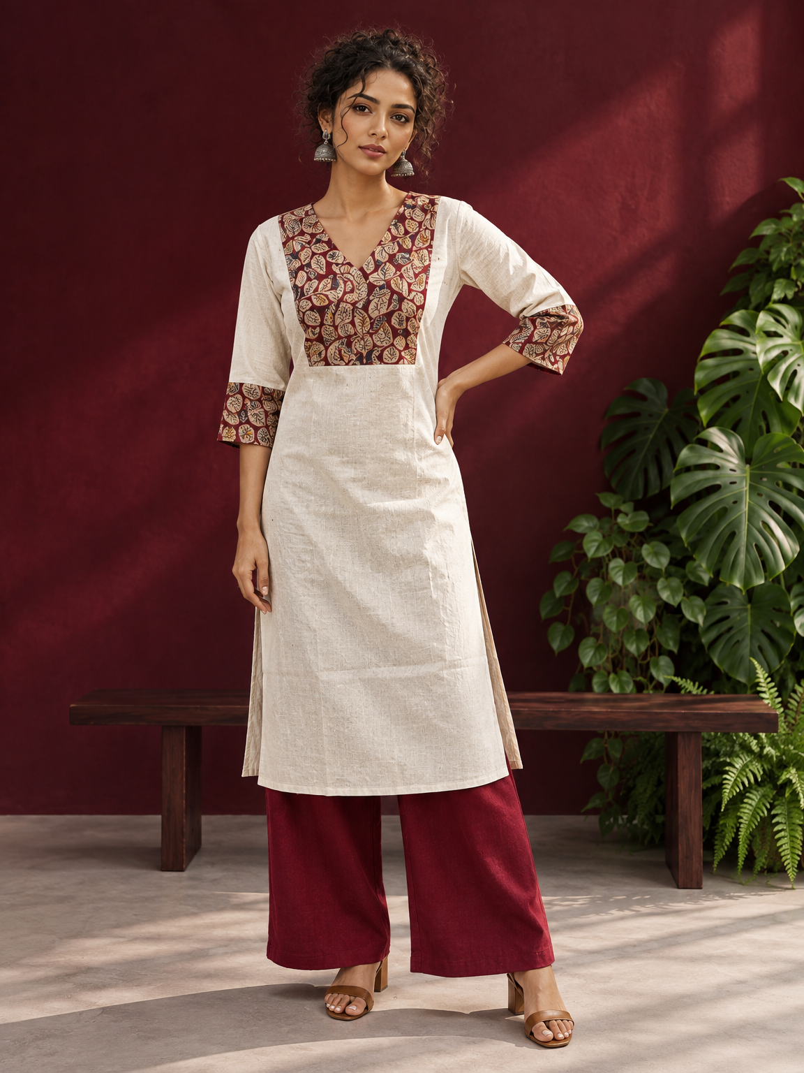 Elegant Off-White Cotton Kurta with Kalamkari Leaf Print Yoke and Contrast Cuffs — front view