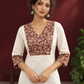 Elegant Off-White Cotton Kurta with Kalamkari Leaf Print Yoke and Contrast Cuffs — fabric detail