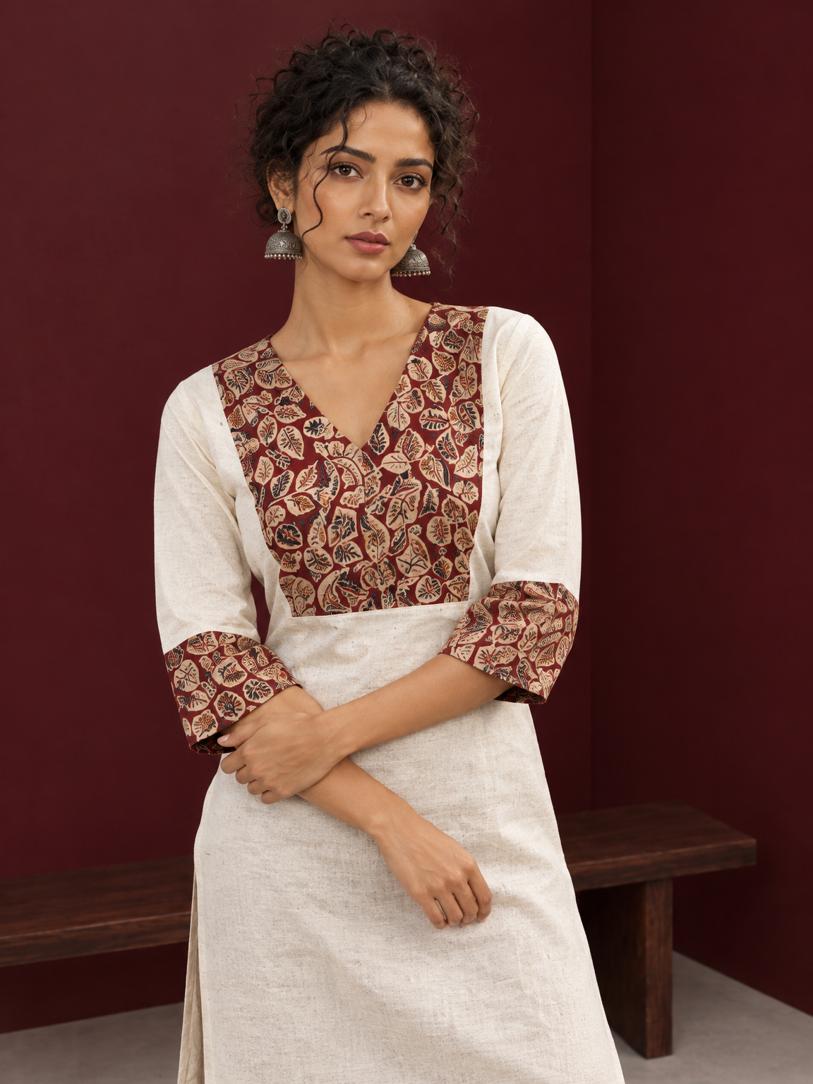 Elegant Off-White Cotton Kurta with Kalamkari Leaf Print Yoke and Contrast Cuffs — styled view
