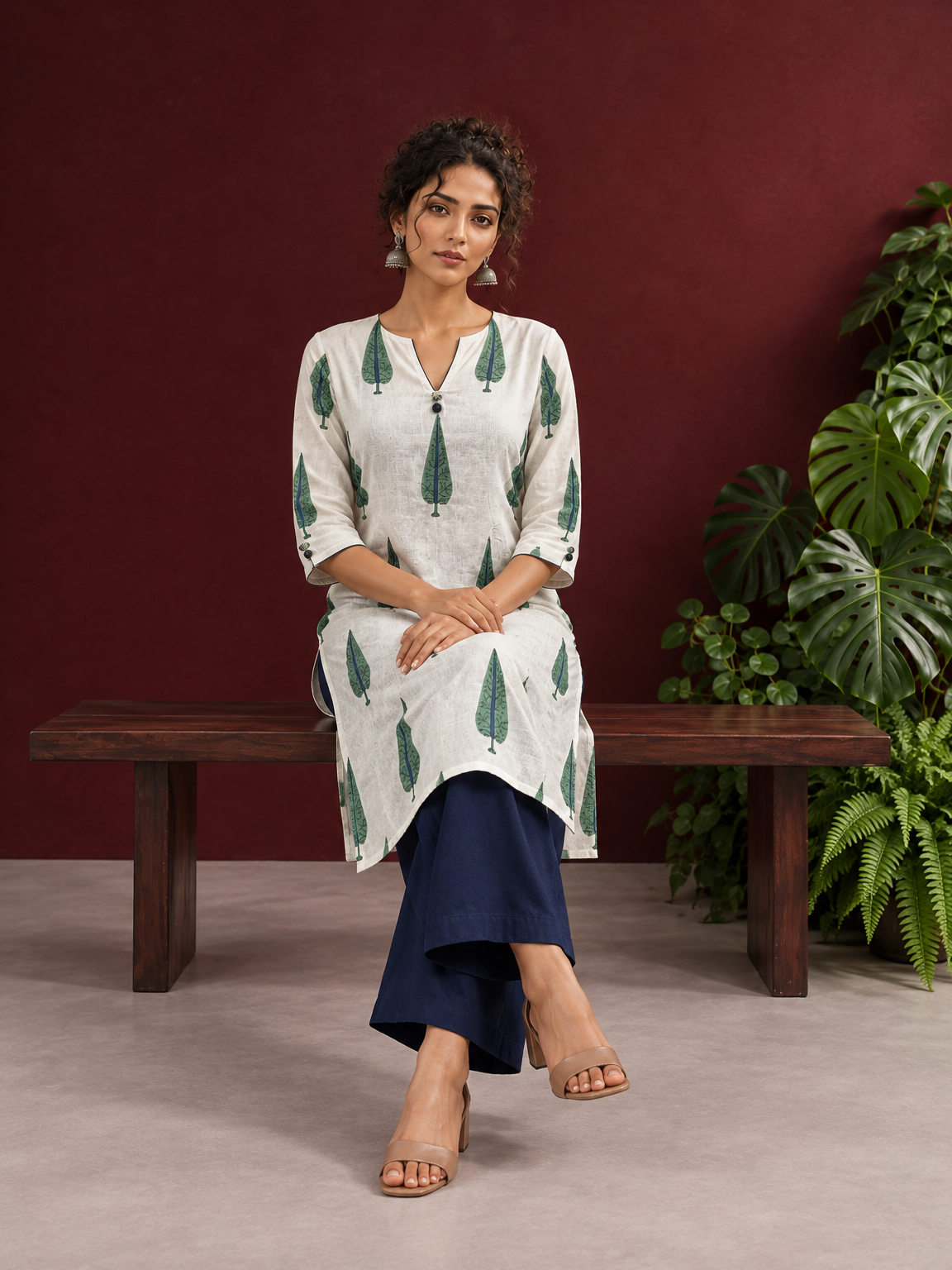Classic Off-White Cotton Kurta with Green Tree Motif Print — seated