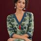 Sage Green Cotton Kurta with Hand Block Printed Floral Motifs and Contrast Navy Striped V-Neck — seated detail