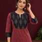 Elegant Maroon Ikat Cotton A Line Kurta With Black Yoke & Ikat Cuff Detailing — styled view