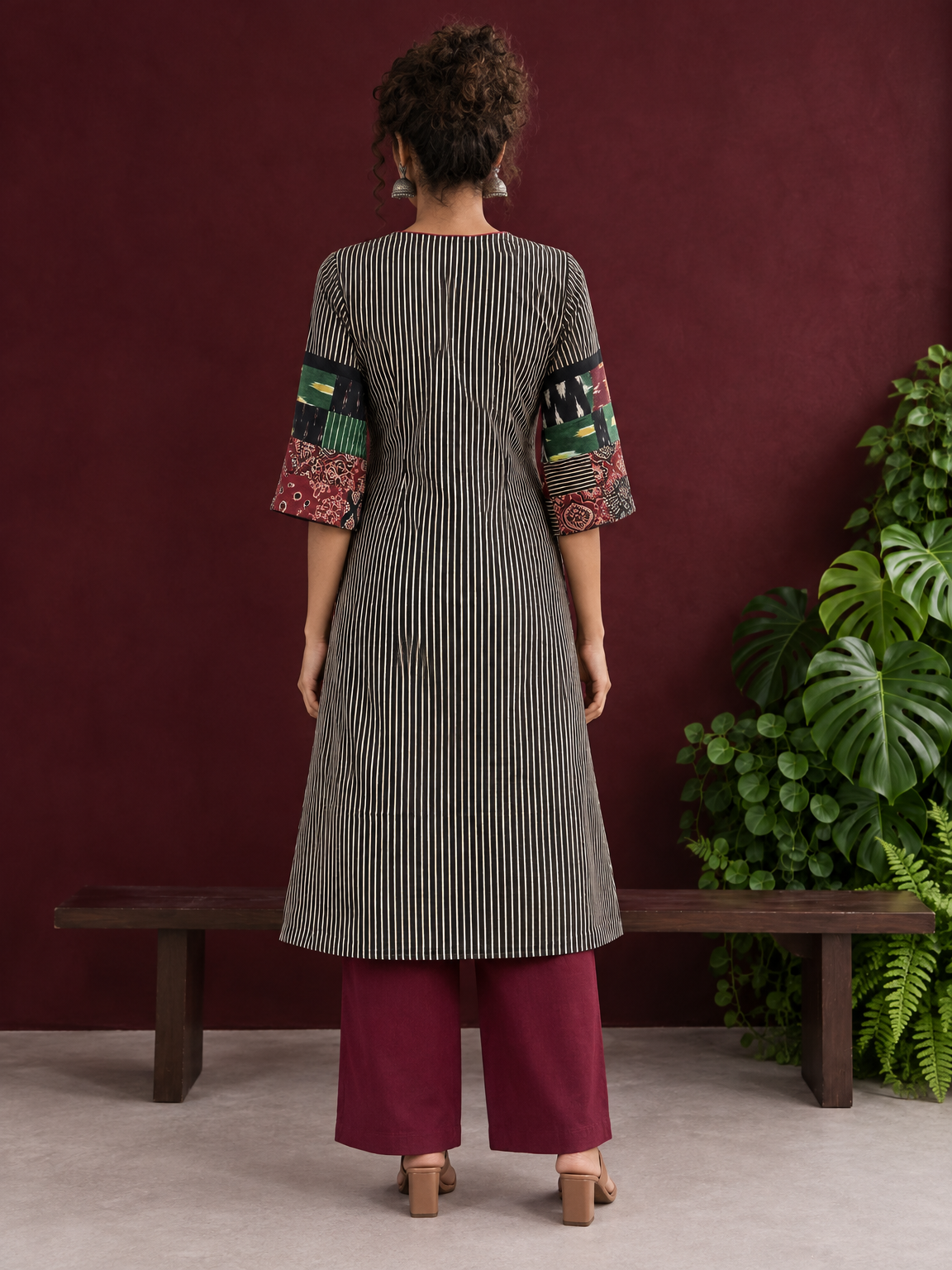 Timeless Black and Off-White Striped Cotton Ajrakh Kurta with Multicolor Patchwork Sleeve Panels — back view