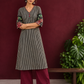 Timeless Black and Off-White Striped Cotton Ajrakh Kurta with Multicolor Patchwork Sleeve Panels — front view