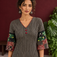 Timeless Black and Off-White Striped Cotton Ajrakh Kurta with Multicolor Patchwork Sleeve Panels — styled view