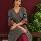 Timeless Black and Off-White Striped Cotton Ajrakh Kurta with Multicolor Patchwork Sleeve Panels — seated detail
