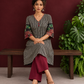 Timeless Black and Off-White Striped Cotton Ajrakh Kurta with Multicolor Patchwork Sleeve Panels — seated