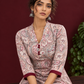 Pink Cotton Paisley Print Kurta with Maroon Button Placket and Contrast Cuffs — seated detail