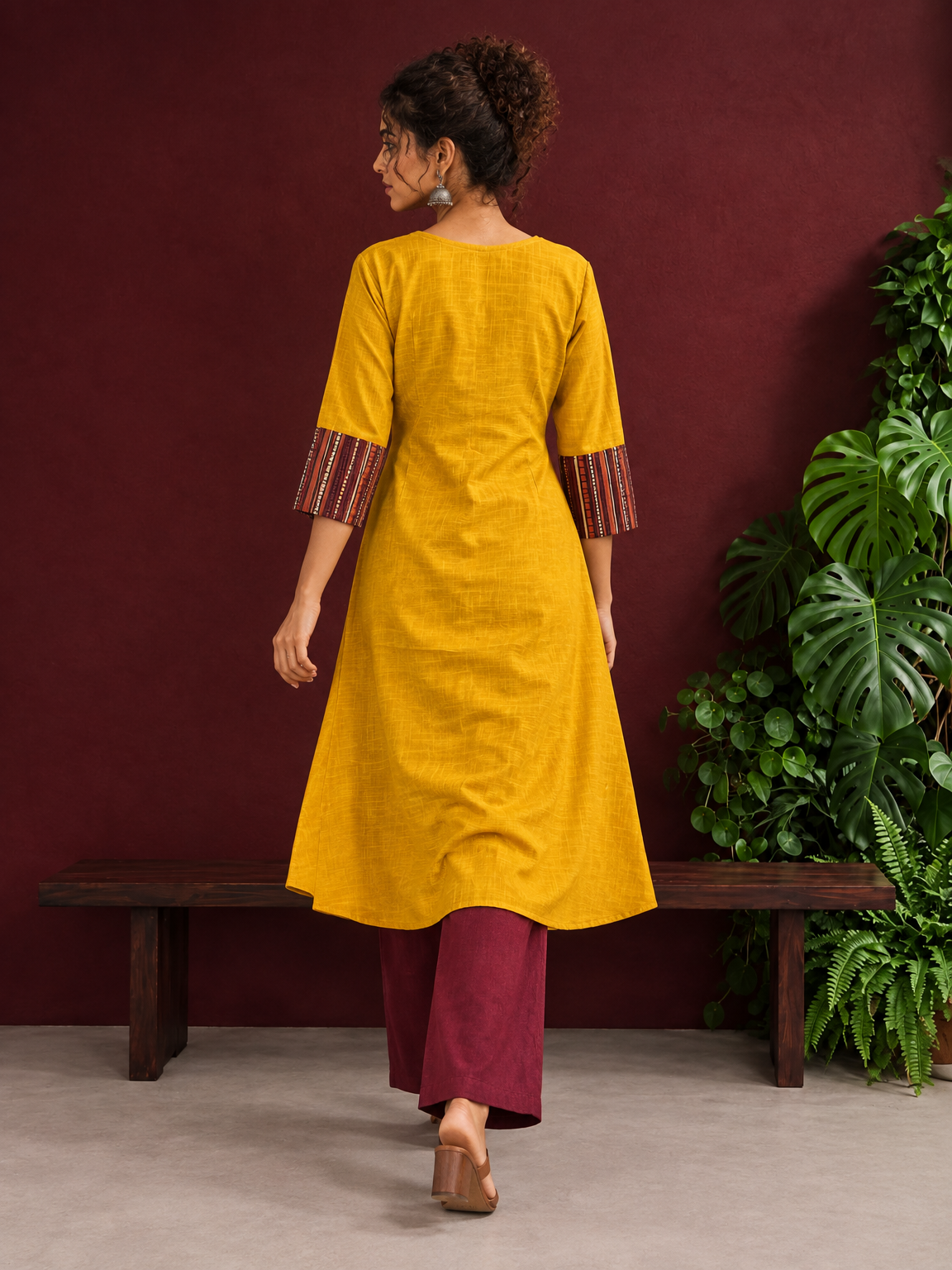 Mustard Yellow Cotton Kurta with Contrast Ajrakh Striped Yoke Panel & Coordinated Sleeve Cuffs — back view