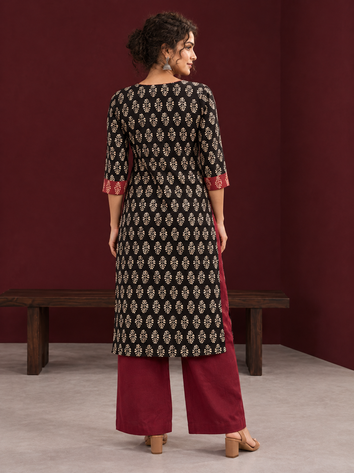 Elegant Black Cotton Ajrakh Kurta with Maroon Contrast Piping, Buttons & Ajrakh Floral Motif Print — back view