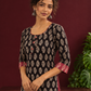 Elegant Black Cotton Ajrakh Kurta with Maroon Contrast Piping, Buttons & Ajrakh Floral Motif Print — styled view