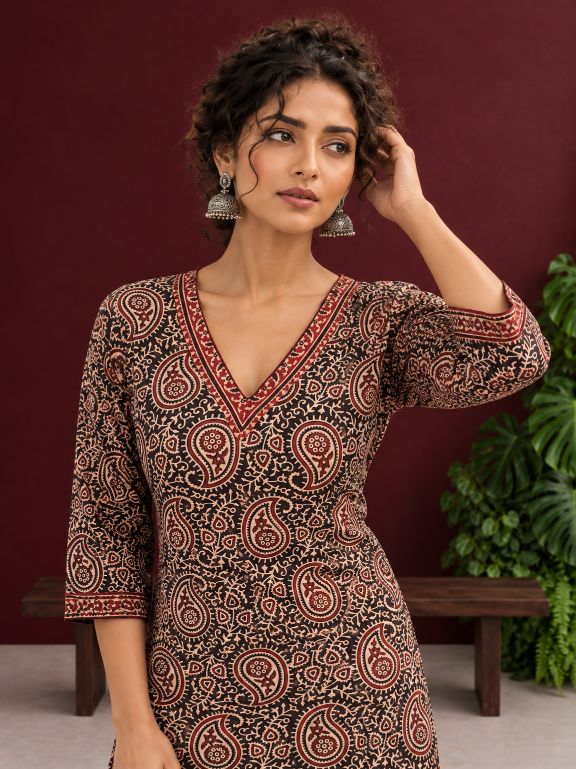 Black Cotton Ajrakh Print Kurta with Maroon Paisley Motifs and Contrast V-Neck Border — styled view