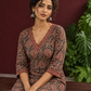 Black Cotton Ajrakh Print Kurta with Maroon Paisley Motifs and Contrast V-Neck Border — seated detail