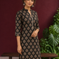 Elegant Black Cotton Kurta with Floral Block Print and Contrast Collar Piping — styled view