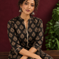 Elegant Black Cotton Kurta with Floral Block Print and Contrast Collar Piping — seated detail