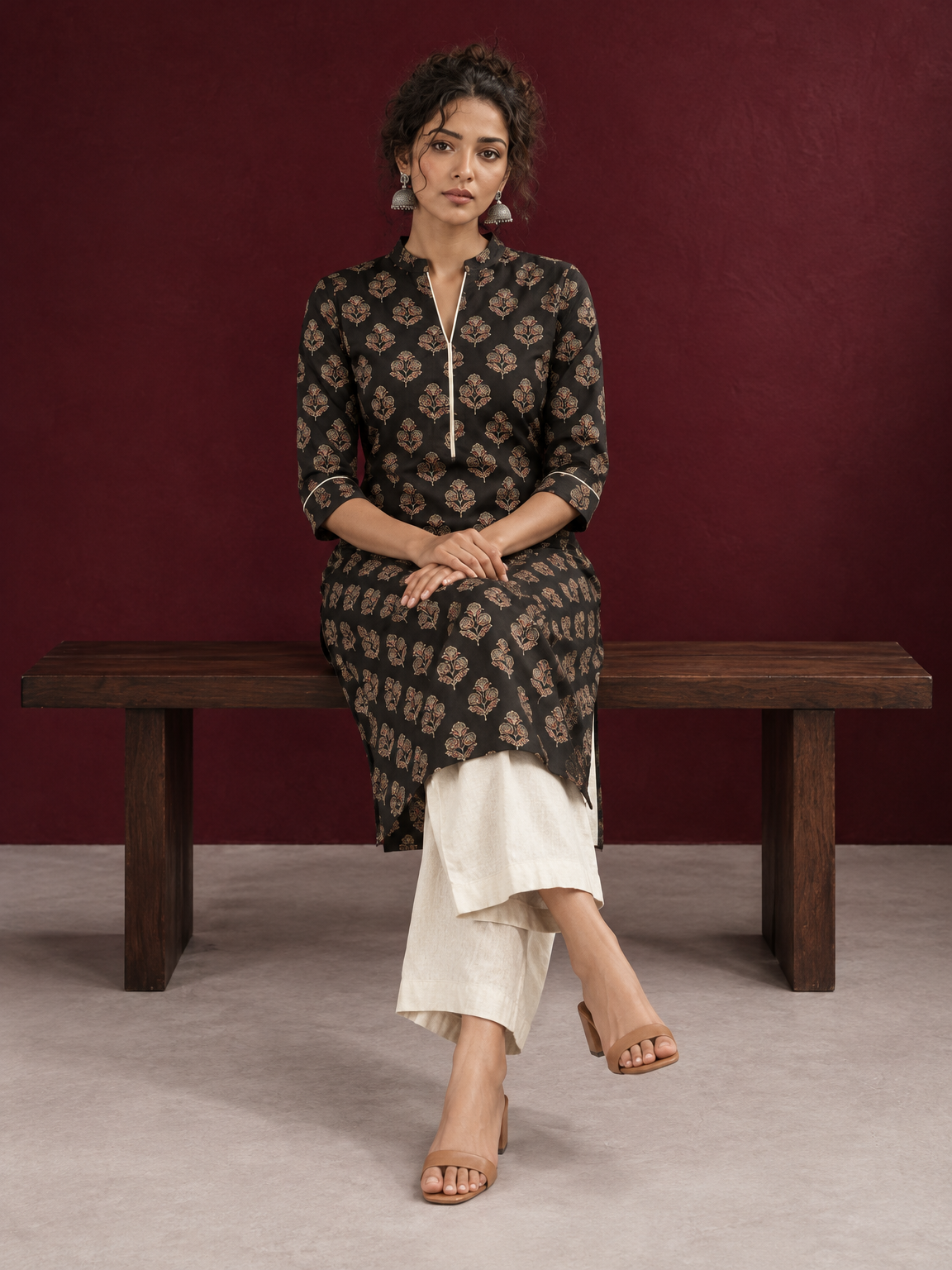 Elegant Black Cotton Kurta with Floral Block Print and Contrast Collar Piping — seated