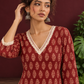 Maroon Cotton Ajrakh Kurta with Floral Motif Block Print and Crochet Lace V-Neck & Sleeve Cuffs — styled view