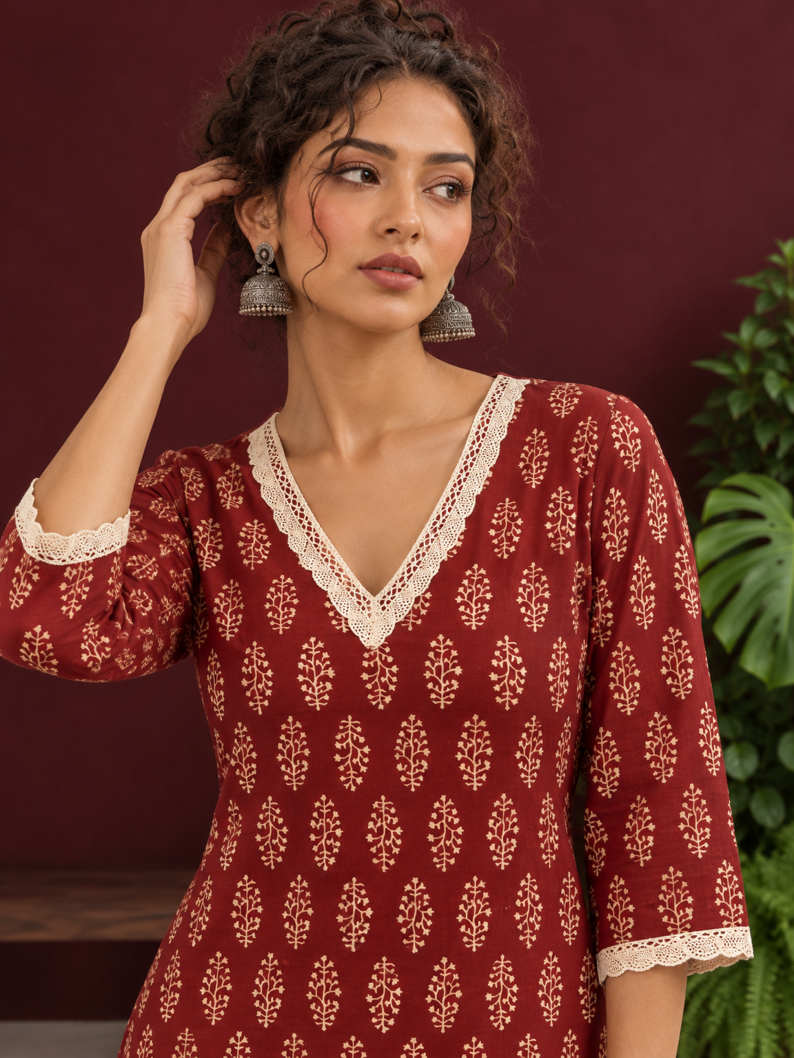 Maroon Cotton Ajrakh Kurta with Floral Motif Block Print and Crochet Lace V-Neck & Sleeve Cuffs — styled view