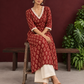 Maroon Cotton Ajrakh Kurta with Floral Motif Block Print and Crochet Lace V-Neck & Sleeve Cuffs — seated