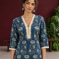 Elegant Indigo Blue Cotton Kurta with Floral Block Print and Crochet Lace V-Neck Trim — styled view