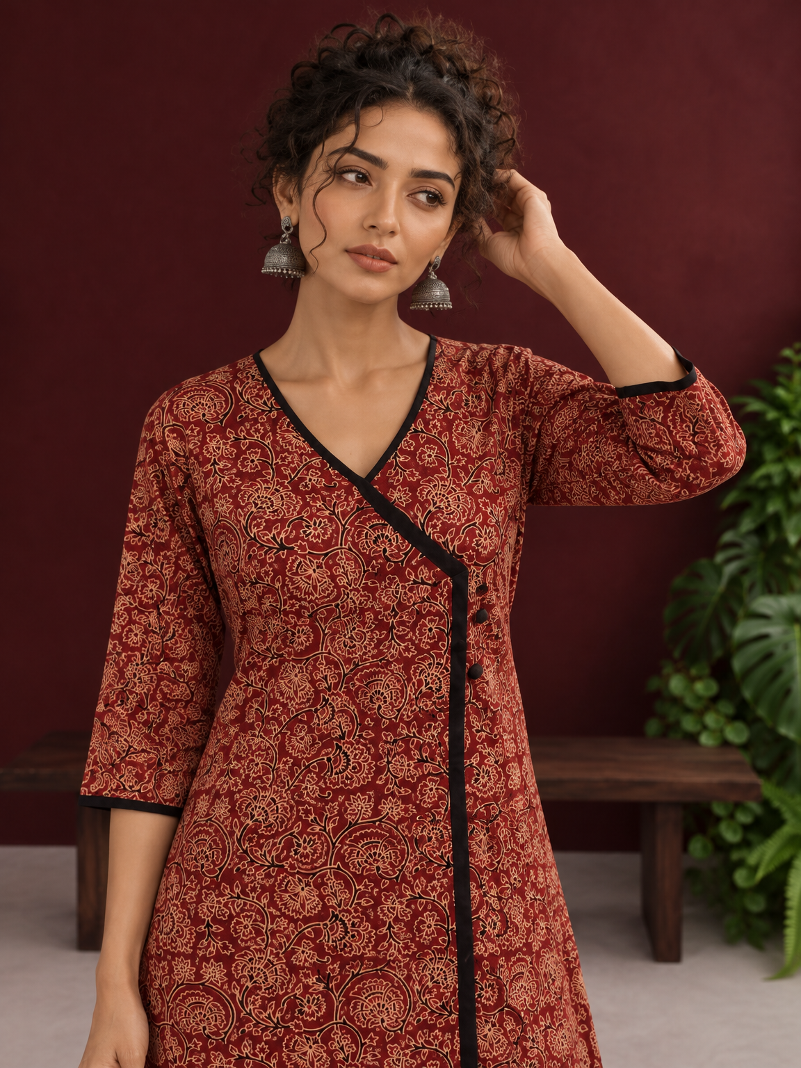 Maroon Cotton Kurta with Ajrakh Floral Print, Black Contrast Binding & Angrakha Style Wrap Front — styled view