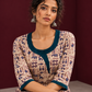 Beige Cotton Kurta with Tribal Motif Print & Contrast Teal Blue V-Neck Panel — seated detail