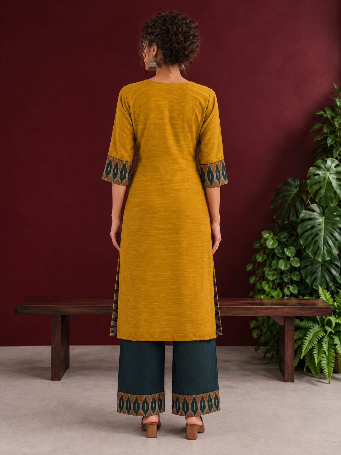 Mustard Yellow Cotton Silk Kurta with Ikat Yoke and Contrast Sleeve Cuffs — back view