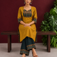 Mustard Yellow Cotton Silk Kurta with Ikat Yoke and Contrast Sleeve Cuffs — seated