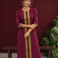 Elegant Maroon Silk Kurta with Contrast Golden Zari Border Placket & Coordinated Sleeve Cuffs — styled view