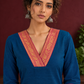Elegant Peacock Blue Cotton Kurta with Contrast Pink & Gold Woven Border Neckline and Matching Salwar — fabric detail