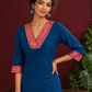 Elegant Peacock Blue Cotton Kurta with Contrast Pink & Gold Woven Border Neckline and Matching Salwar — styled view
