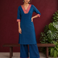 Elegant Peacock Blue Cotton Kurta with Contrast Pink & Gold Woven Border Neckline and Matching Salwar — front view