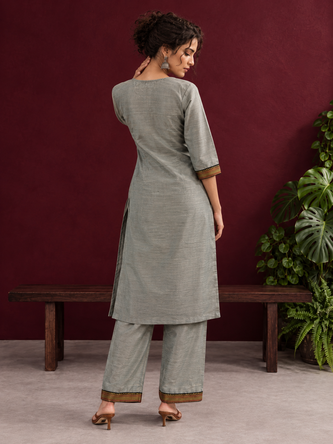 Elegant Sage Green Silk Kurta with Black zari Paisley Yoke & Contrast Sleeve Cuffs — back view