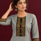 Elegant Sage Green Silk Kurta with Black zari Paisley Yoke & Contrast Sleeve Cuffs — styled view