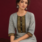Elegant Sage Green Silk Kurta with Black zari Paisley Yoke & Contrast Sleeve Cuffs — seated detail