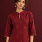 Elegant Maroon Cotton Silk Kurta with Golden Motif Print With Mandarin Collar — styled view