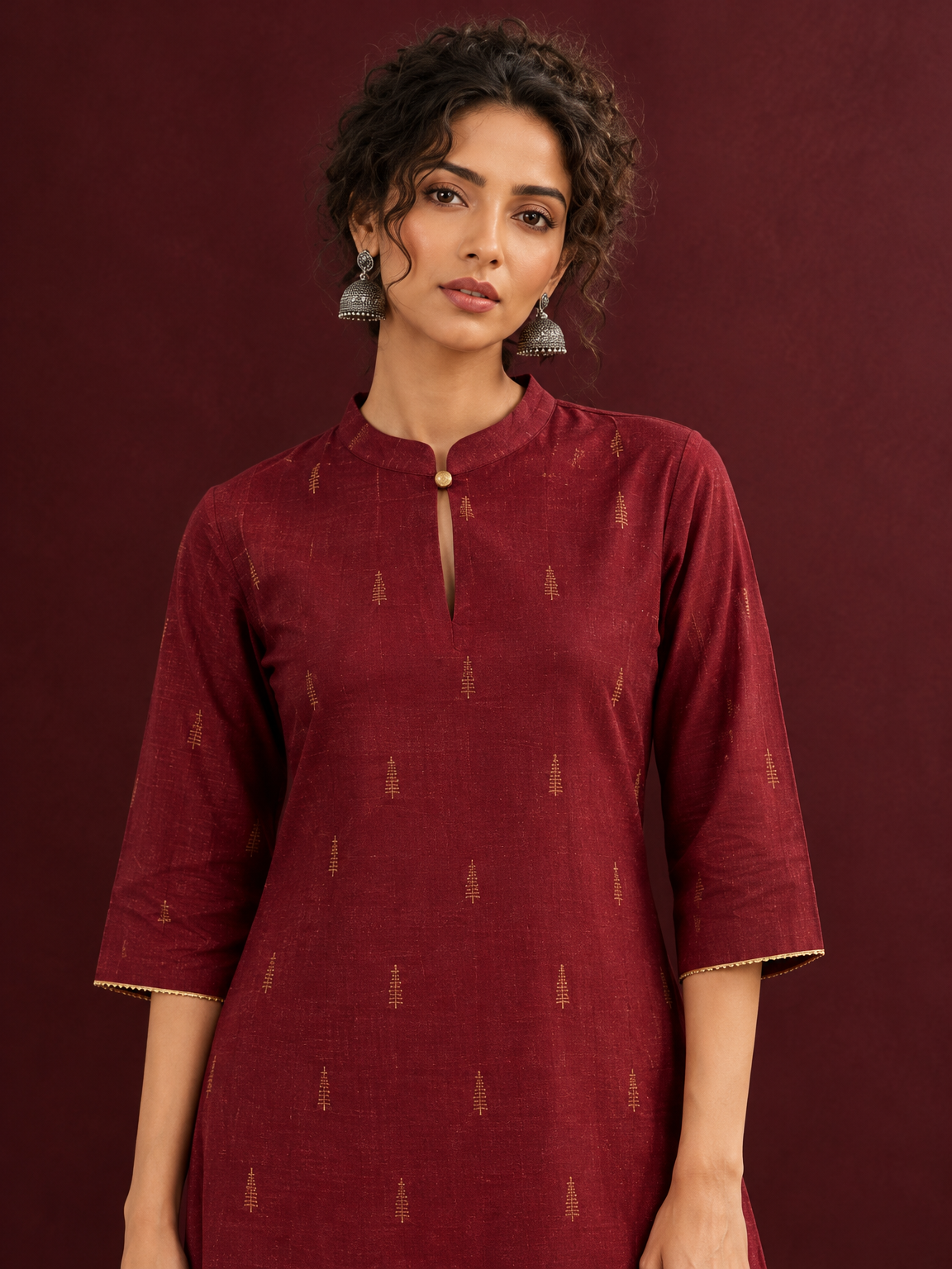 Elegant Maroon Cotton Silk Kurta with Golden Motif Print With Mandarin Collar — styled view