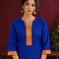 Elegant Royal Blue Cotton Silk Kurta with Contrast Mustard & Red Traditional Border On Neckline and Sleeve Cu — fabric detail