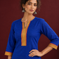 Elegant Royal Blue Cotton Silk Kurta with Contrast Mustard & Red Traditional Border On Neckline and Sleeve Cuff — styled view